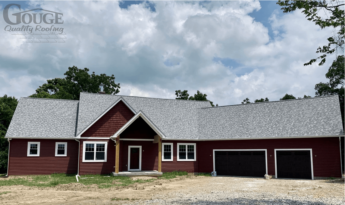 new residential home build with asphalt shingle roof; gouge logo in upper left corner