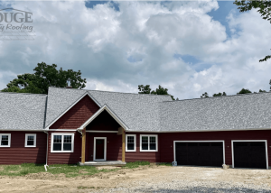 new residential home build with asphalt shingle roof; gouge logo in upper left corner