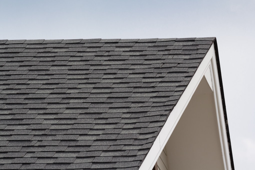 close up shot of gray and black gable roof