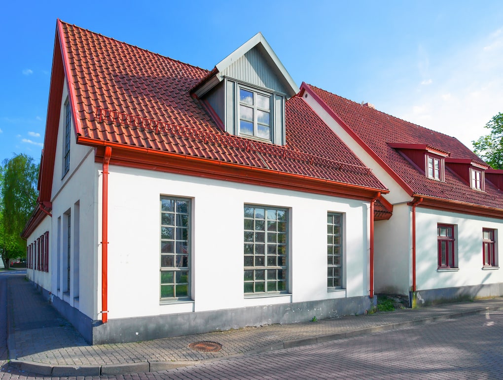 White painted houses with red roof color combinations