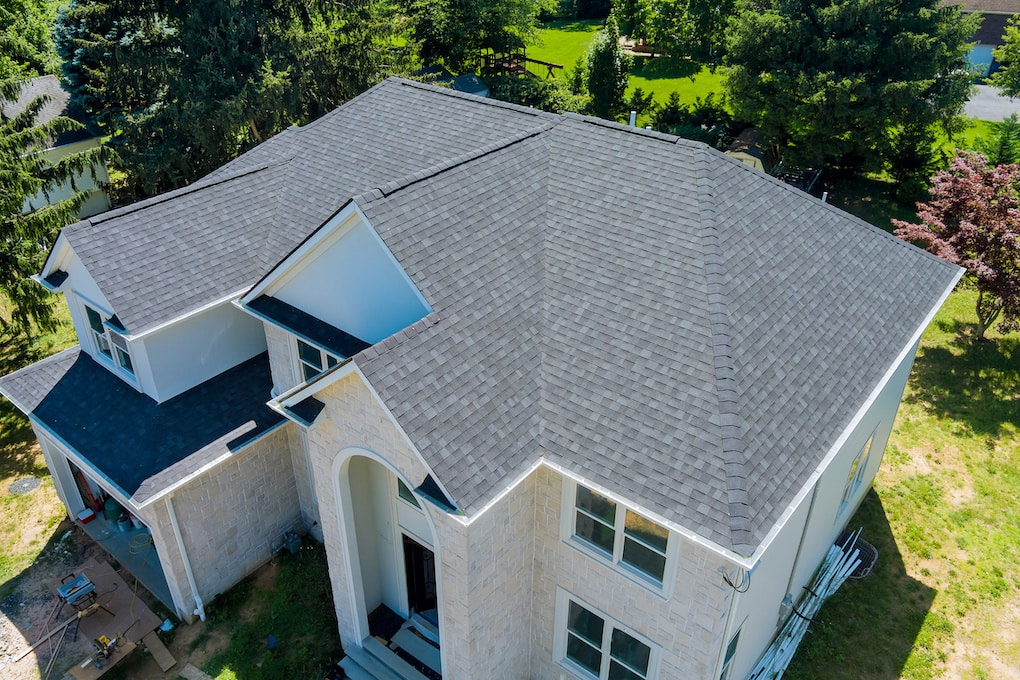 asphalt shingles on large home