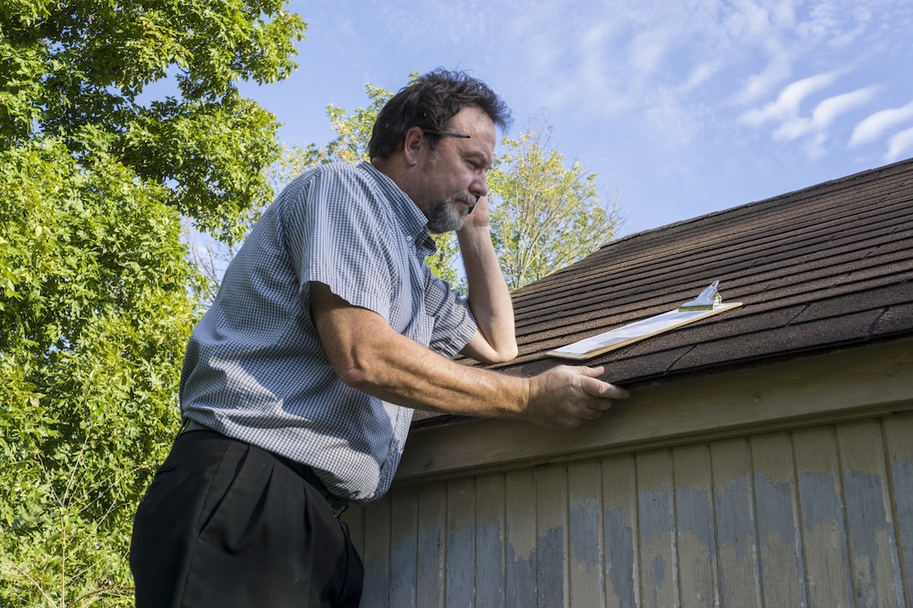 insurance adjuster for roof claim