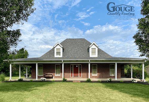 brick home with new roof from Gouge Quality roofing #2