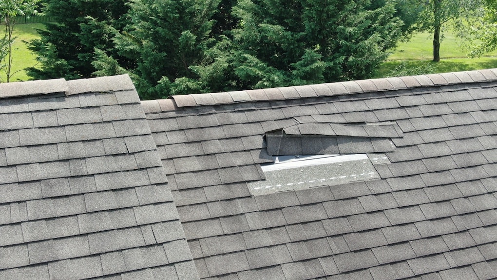 curling shingles on roof during roof inspection 