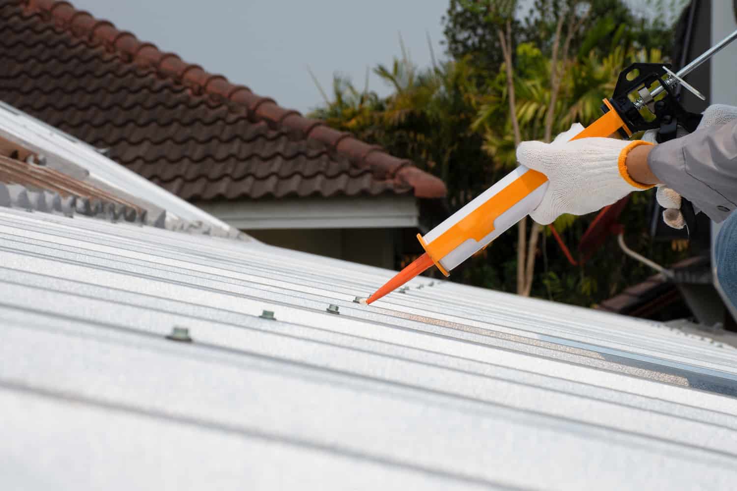 Metal Roof Sealant: 4 Best Types (2023 Update) - Gouge Quality Roofing