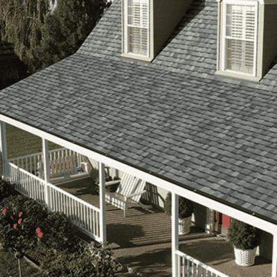 Image of a grey owens corning shingled roof and white house